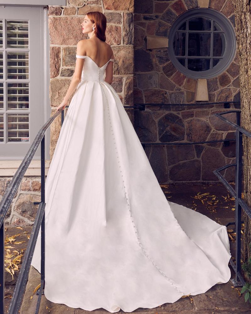 La22120 simple satin off the shoulder wedding dress with pockets and ball gown silhouette2